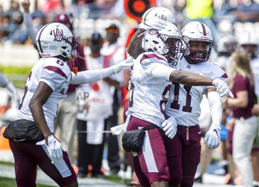 Eric Shelton Alabama A&M players celebrates a touchdown against Jackson State during an NCAA college football game, Saturday, April 10, 2021, at Veterans Memorial Stadium in Jackson, Miss. (Eric Shelton/The Clarion-Ledger via AP)