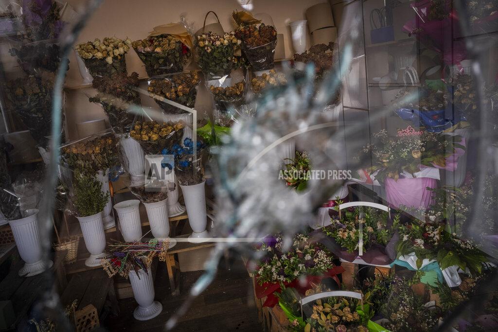 Bernat Armangue Dried flower bouquets inside a flower shop in a temporary closed market Kharkiv, eastern Ukraine, Tuesday, May 24, 2022. (AP Photo/Bernat Armangue)