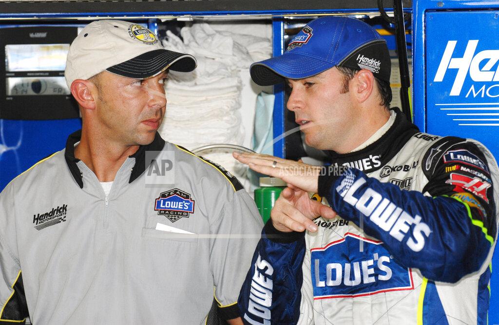 Sandy Macys FILE - In this July 14, 2006, file photo, crew chief Chad Knaus, left, talks with driver Jimmie Johnson during practice for the Lenox Industrial Tools 300 at New Hampshire International Speedway in Loudon, N.H. Once Johnson was paired with Knaus as crew chief the duo took off and won a record-tying seven championships as the No. 48 team blossomed into one of the best in NASCAR history. But their relationship could be bumpy despite a 17-year friendship and all their success, and the strain of underperforming last year was the final push toward their split. (AP Photo/Sandy Macys, File)