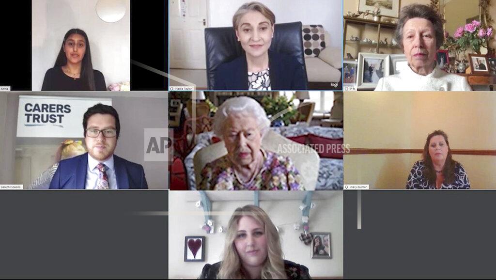 Buckingham Palace In this video grab issued Thursday June 11, 2020, by Buckingham Palace, showing Britain's Queen Elizabeth II, centre, and the Princess Royal Princess Anne, top right, as they take part in a video call with carers supported by the Carers Trust, on June 4, 2020. The monarch talked with four carers and the trust's chief executive Gareth Howells, centre left, on June 4 from Windsor Castle, during the coronavirus pandemic lockdown. As part of Carers Week in the U.K., the 94-year-old monarch showed once again that she's adept at meeting the challenges posed by new technologies, taking part in her first public video conference call to chat to four carers about the challenges they face looking after someone close to them during the coronavirus pandemic.
(Carer's Trust/Buckingham Palace via AP)