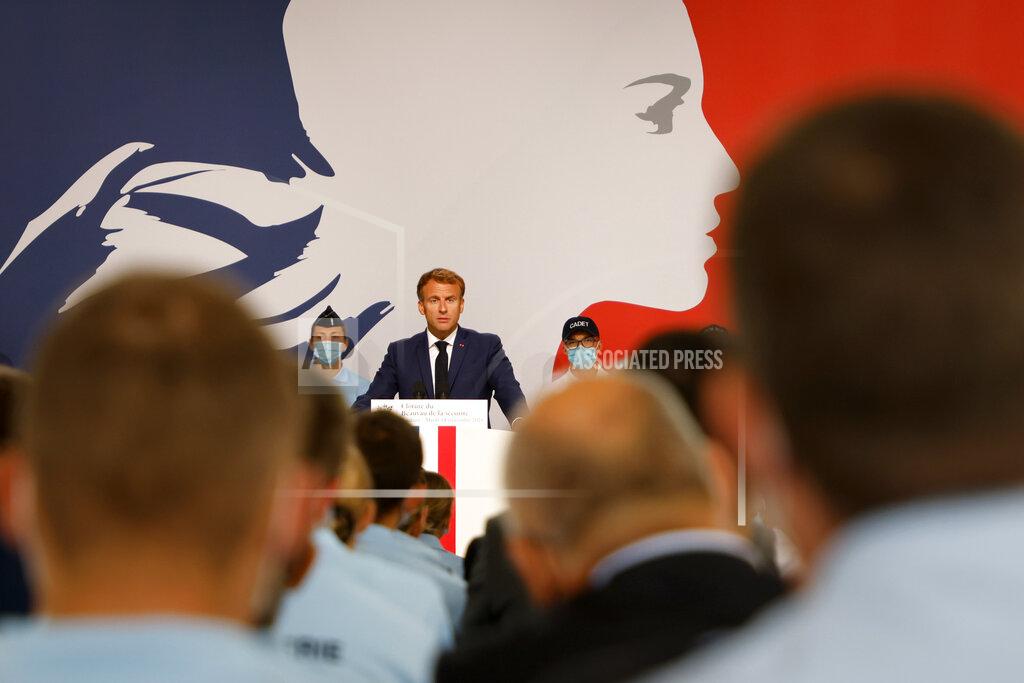 Ludovic Marin French President Emmanuel Macron speaks during his visit at the police academy of Roubaix, northern France, Tuesday, Sept. 14, 2021. (Ludovic Marin, Pool via AP)