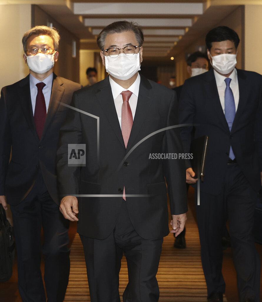 Lee Jin-Wook South Korean National Security Council Chairman Suh Hoon, center, arrives to meet with Yang Jiechi, a top Chinese official in charge of diplomatic affairs, at a hotel in Busan, South Korea, Saturday, Aug. 22, 2020. The meeting between Yang and Suh are expected to discuss Chinese President Xi Jinping's visit to South Korea this year. (Lee Jin-wook/Yonhap via AP)