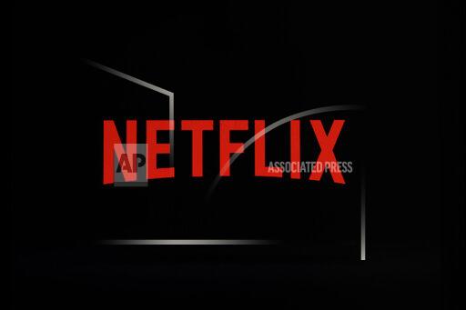 FILE- This July 17, 2017, file photo shows a Netflix logo on an iPhone in Philadelphia. Netflix posted sharply higher third-quarter earnings Tuesday, Oct. 19, 2021, thanks to a stronger slate of titles, including “Squid Game," the dystopian survival drama from South Korea that the company says became its biggest-ever TV show. (AP Photo/Matt Rourke, File)
