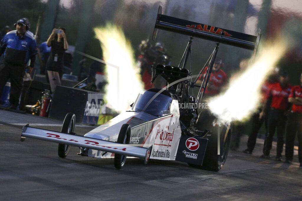 Bob Szelag In this photo provided by the NHRA,Mike Salinas drives in Top Fuel qualifying Friday, Aug. 12, 2022, at Heartland Motorsports Park for the Menards NHRA Nationals drag races in Topeka, Kan. (Bob Szelag/NHRA via AP)
