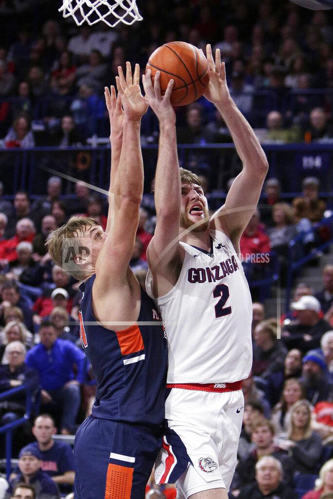 Young Kwak Gonzaga forward Drew Timme, right, shoots while pressured by Pepperdine forward Jan Zidek during the first half of an NCAA college basketball game in Spokane, Wash., Saturday, Jan. 4, 2020. (AP Photo/Young Kwak)