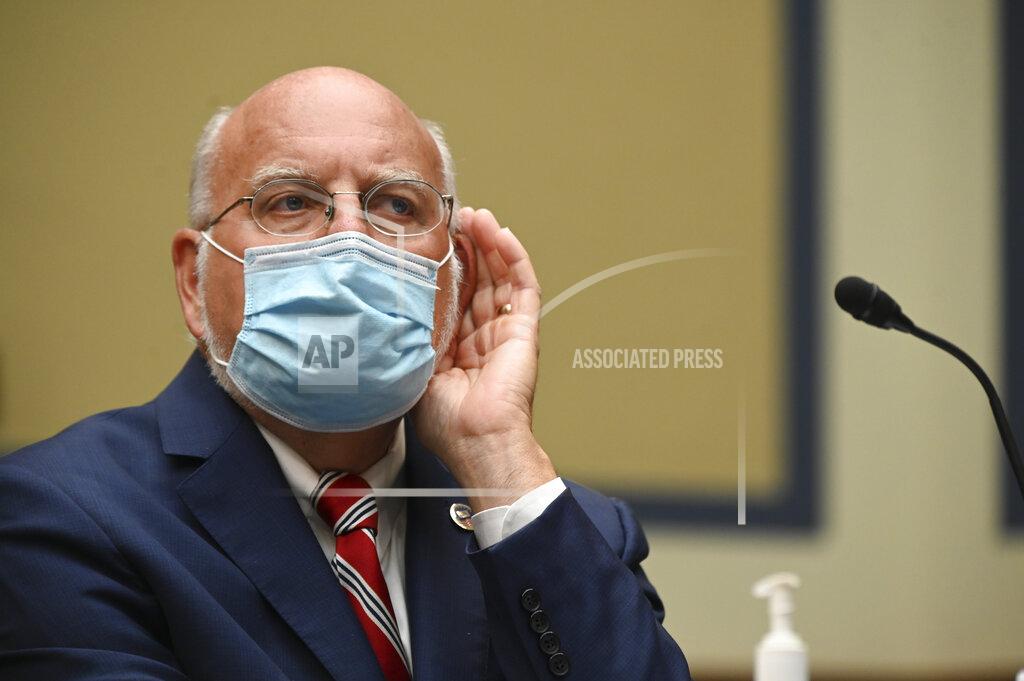 Erin Scott Robert Redfield, director of the Centers for Disease Control and Prevention (CDC), testifies before a House Select Subcommittee hearing on the Coronavirus, Friday, July 31, 2020 on Capitol Hill in Washington. (Erin Scott/Pool via AP)