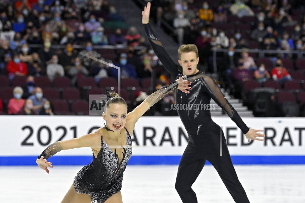 David Becker Aleksandra Boikova and Dmitrii Kozlovskii, of Russia, perform during the pairs short program at the Skate America figure skating event Friday, Oct. 22, 2021, in Las Vegas. (AP Photo/David Becker)