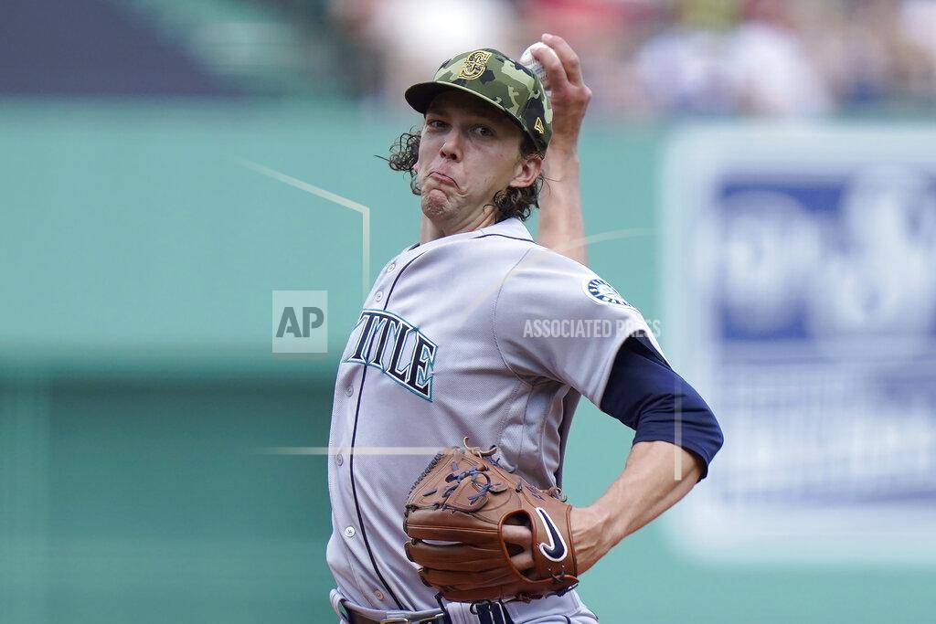 Steven Senne Seattle Mariners' Logan Gilbert winds up for a pitch against the Boston Red Sox in the first inning of a baseball game Sunday, May 22, 2022, in Boston. (AP Photo/Steven Senne)