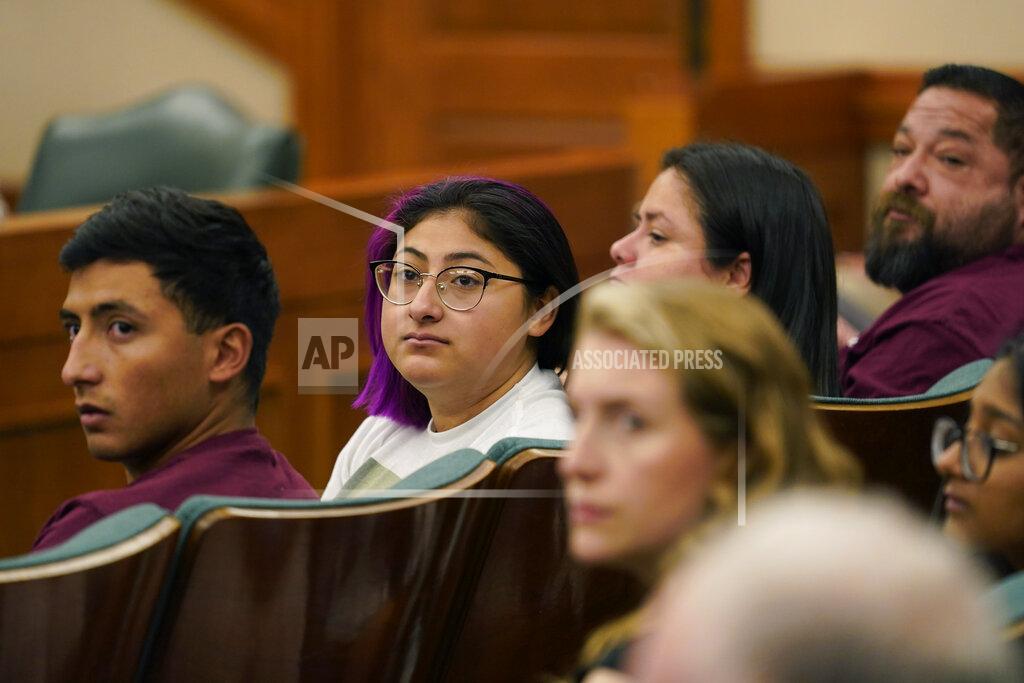 Eric Gay Jazmin Cazares, second from left, whose young sister Jacklyn was was one of 19 children killed at Robb Elementary School, attends a hearing at the state capitol, Thursday, June 23, 2022, in Austin, Texas. Cazares pleaded for Texas lawmakers to pass gun safety legislation and questioned why so many security measures failed. (AP Photo/Eric Gay)