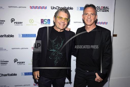 File - Director Stephen Gyllenhaal, left, and Dan Pallotta attend the premiere of &quot;Uncharitable&quot; on Sept. 21, 2023, in New York. The new documentary puts the long-running debate in the nonprofit sector over the role of overhead back in the spotlight. (Photo by Charles Sykes/Invision/AP, File)