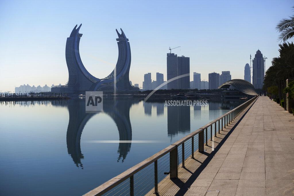 Pavel Golovkin A view of Lusail Marina Corniche with the Crescent Tower Lusail, left, in the background in Lusail, Qatar, Thursday, Nov. 24, 2022. (AP Photo/Pavel Golovkin)