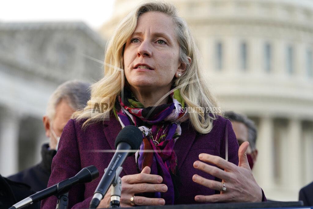 Jacquelyn Martin Rep. Abigail Spanberger, D-Va., speaks during a news conference with the Problem Solvers Caucus about the expected passage of the emergency COVID-19 relief bill, Monday, Dec. 21, 2020, on Capitol Hill in Washington. Congressional leaders have hashed out a massive, year-end catchall bill that combines $900 billion in COVID-19 aid with a $1.4 trillion spending bill and reams of other unfinished legislation on taxes, energy, education and health care. (AP Photo/Jacquelyn Martin)