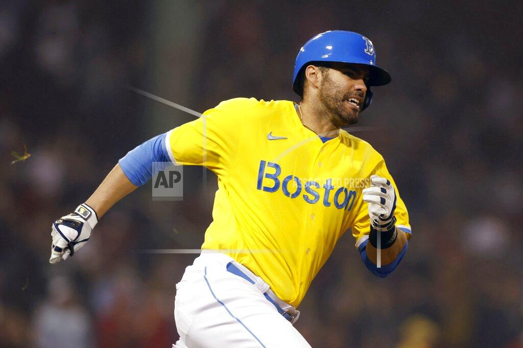 Michael Dwyer Boston Red Sox's J.D. Martinez nears first on his RBI double during the fifth inning of the team's baseball game against the Baltimore Orioles, Friday, Sept. 17, 2021, in Boston. (AP Photo/Michael Dwyer)