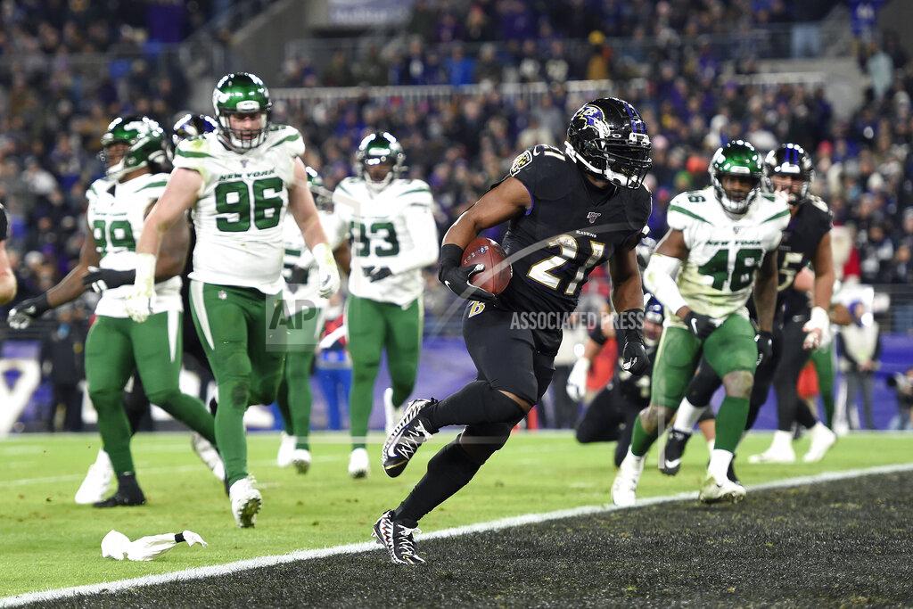 Gail Burton File-This Dec. 12, 2019, file photo shows Baltimore Ravens running back Mark Ingram (21) scoring on a two-point conversion against the New York Jets during the first half of an NFL football game, in Baltimore. As he draws closer to a milestone birthday, Ingram wants everyone to know he's still got what it takes to score a bunch of touchdowns, rush for 1,000 yards and earn an invite to the Pro Bowl. “I feel like people say when you're 30 you're dead,” Ingram said Wednesday. “I turn 30 at the end of this week, but my best football is ahead of me." (AP Photo/Gail Burton, File)