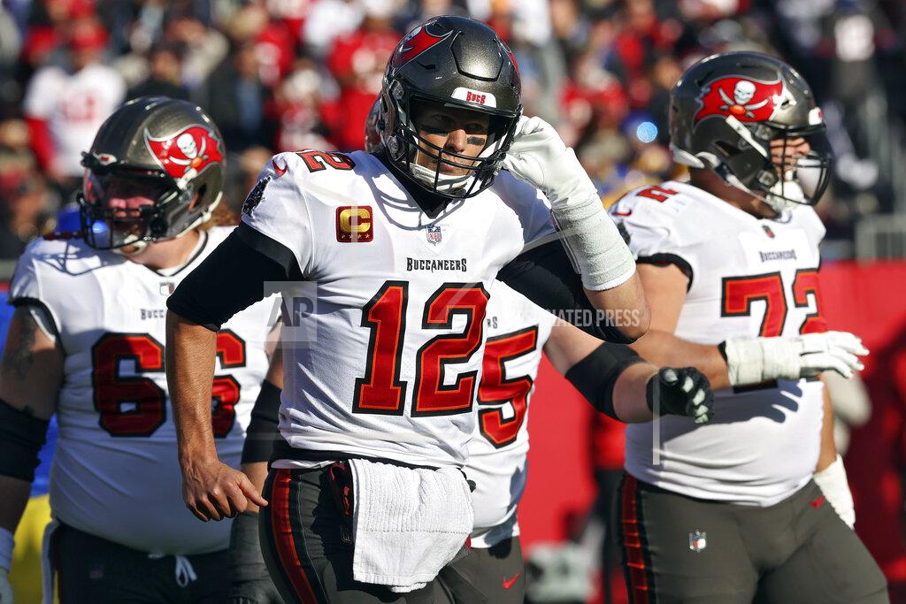 Mark Lomoglio Tampa Bay Buccaneers quarterback Tom Brady (12) walks off after a drive stalled against the Los Angeles Rams during the first half of an NFL divisional round playoff football game Sunday, Jan. 23, 2022, in Tampa, Fla. (AP Photo/Mark LoMoglio)
