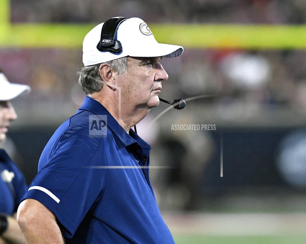 Timothy D. Easley Georgia Tech head coach Paul Johnson watches from the sideline during the first half of an NCAA college football game against Louisville, Friday, Oct. 5, 2018, in Louisville, Ky. (AP Photo/Timothy D. Easley)