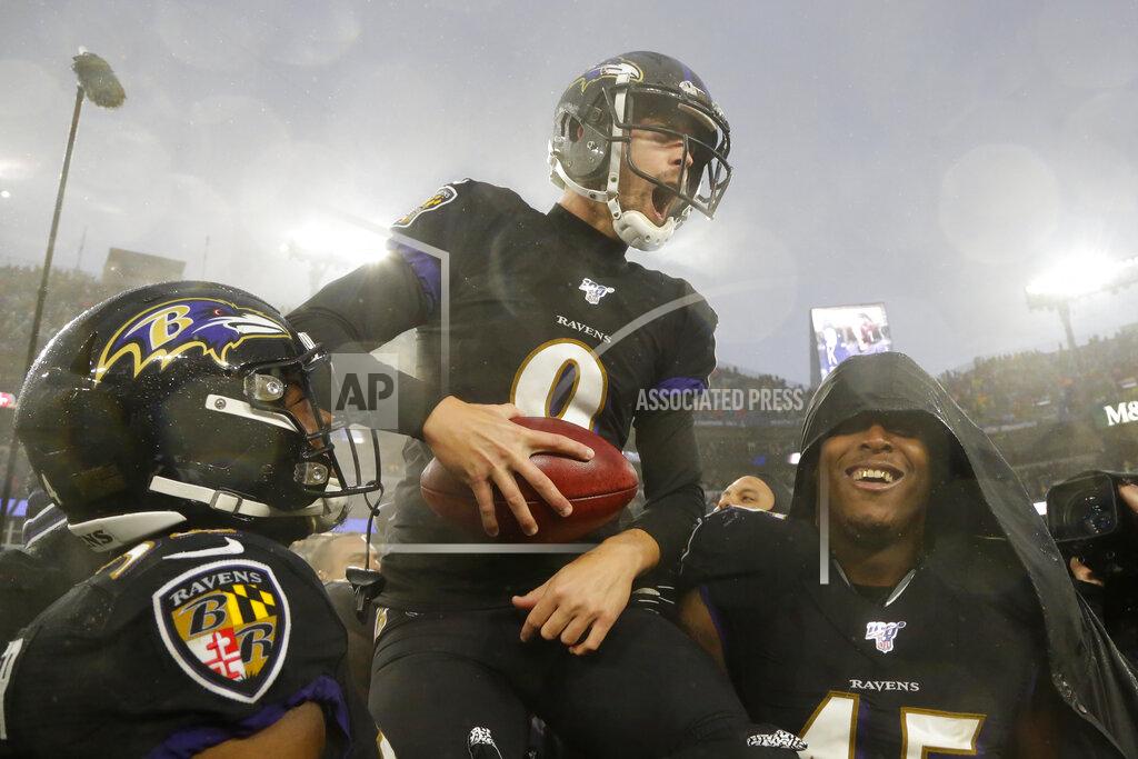 Julio Cortez Baltimore Ravens kicker Justin Tucker (9) is carried off field by his teammates after making a game winning field goal against the San Francisco 49ers in an NFL football game, Sunday, Dec. 1, 2019, in Baltimore, Md. Ravens won 20-17. (AP Photo/Julio Cortez)