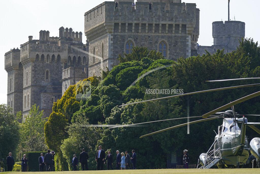 Patrick Semansky President Joe Biden and first lady Jill Biden walk to a motorcade vehicle after stepping off Marine One at Windsor Castle in Windsor, England, Sunday, June 13, 2021. The Bidens are meeting with Queen Elizabeth II. (AP Photo/Patrick Semansky)