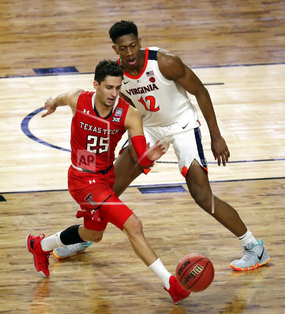 Matt York Texas Tech's Davide Moretti (25) an d Virginia's De'Andre Hunter (12) chase a loose ball during the overtime in the championship of the Final Four NCAA college basketball tournament, Monday, April 8, 2019, in Minneapolis. (AP Photo/Matt York)