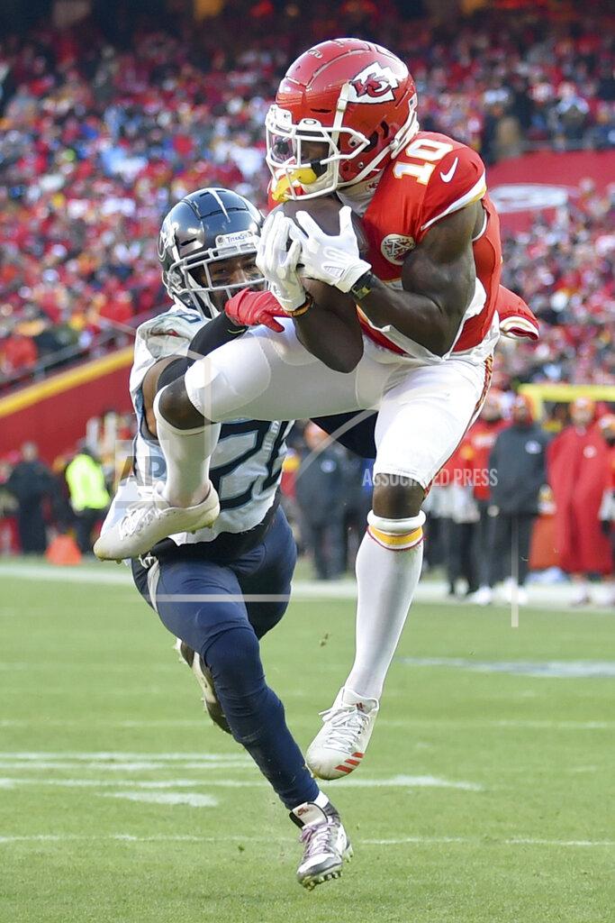 Ed Zurga Kansas City Chiefs' Tyreek Hill catches a touchdown pass in front of Tennessee Titans' Logan Ryan during the first half of the NFL AFC Championship football game Sunday, Jan. 19, 2020, in Kansas City, MO. (AP Photo/Ed Zurga)