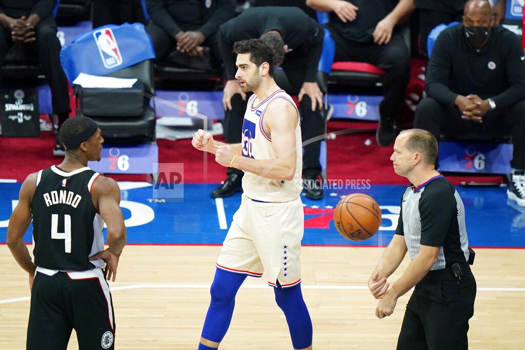 Matt Slocum Philadelphia 76ers' Furkan Korkmaz, center, celebrates past Los Angeles Clippers' Rajon Rondo after a making basket during the second half of an NBA basketball game, Friday, April 16, 2021, in Philadelphia. (AP Photo/Matt Slocum)