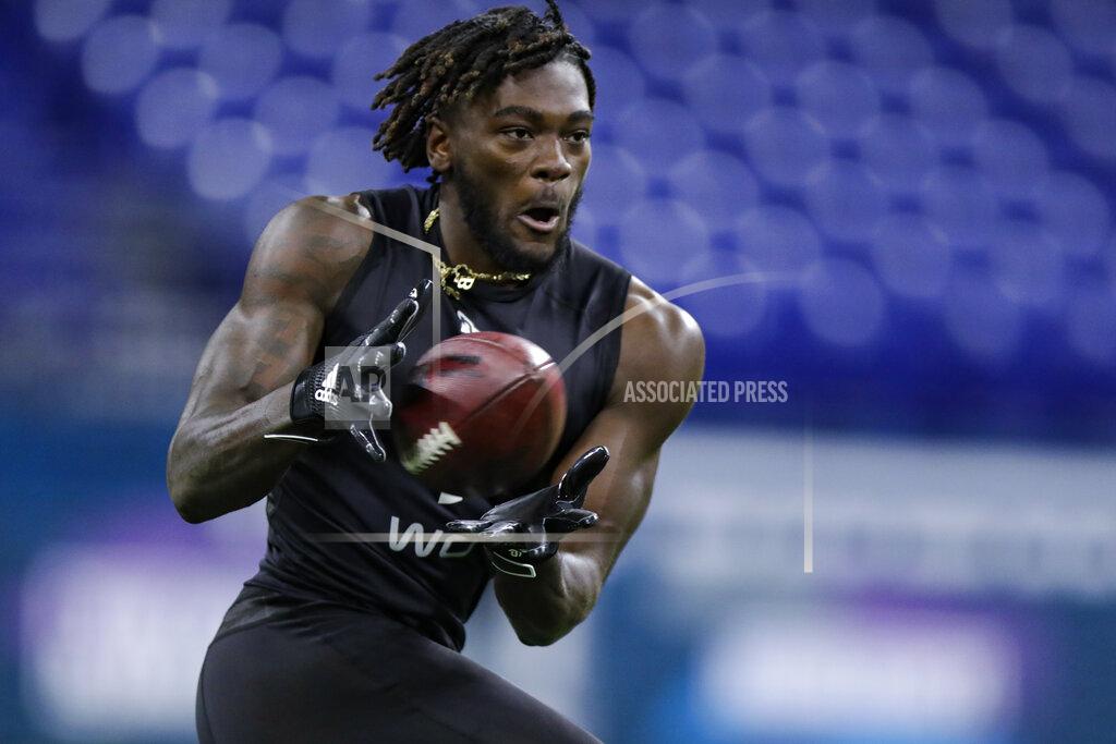 Michael Conroy FILE - In this Feb. 27, 2020, file photo, Arizona State wide receiver Brandon Aiyuk runs a drill at the NFL football scouting combine in Indianapolis. Aiyuk was chosen by the San Francisco 49ers in the first round of the NFL draft. (AP Photo/Michael Conroy, File)