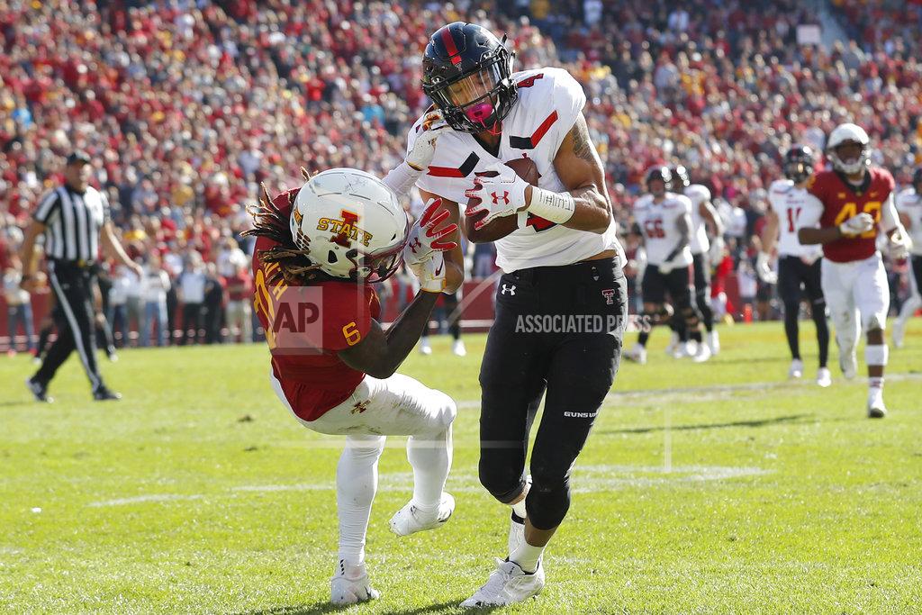 Charlie Neibergall Texas Tech wide receiver Antoine Wesley (4) catches a 31-yard touchdown pass over Iowa State defensive back De'Monte Ruth (6) during the second half of an NCAA college football game, Saturday, Oct. 27, 2018, in Ames, Iowa. (AP Photo/Charlie Neibergall)