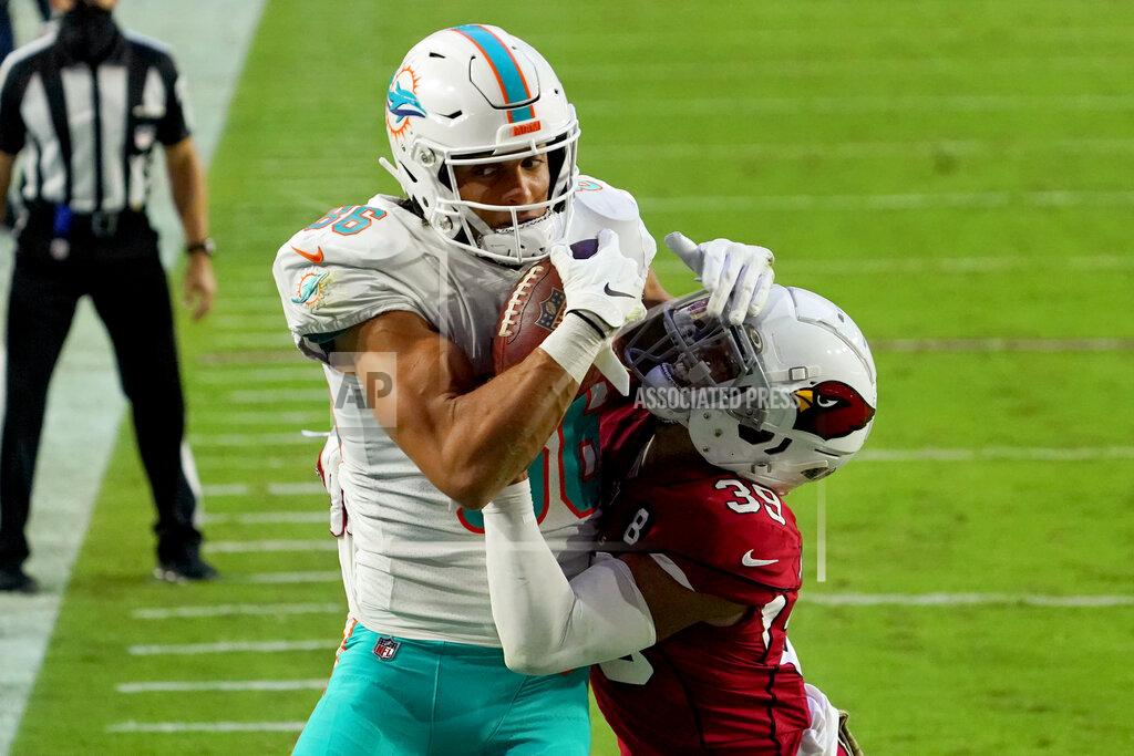 Rick Scuteri Miami Dolphins wide receiver Mack Hollins pulls in a touchdown pass as Arizona Cardinals cornerback Jace Whittaker, right, defends during the second half of an NFL football game, Sunday, Nov. 8, 2020, in Glendale, Ariz. (AP Photo/Rick Scuteri)