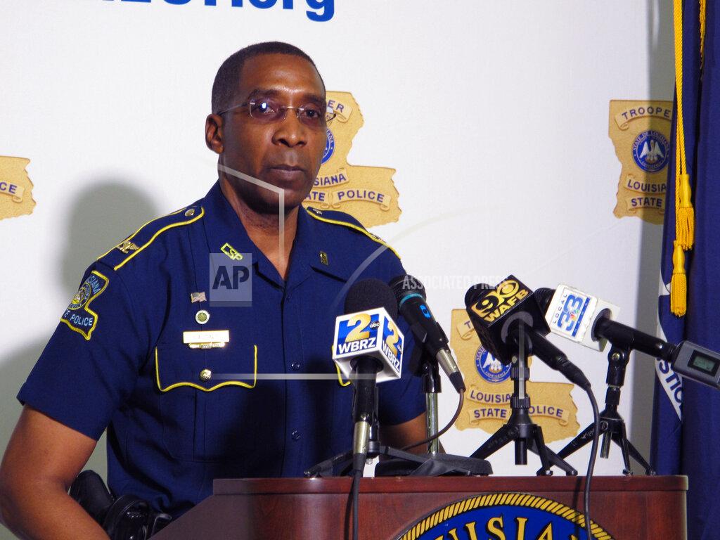Melinda Deslatte FILE - In this Friday, May 21, 2021 file photo, Col. Lamar Davis, superintendent of the Louisiana State Police, speaks about the agency's release of video involving the death of Ronald Greene, at a press conference in Baton Rouge, La. Greene was jolted with stun guns, put in a chokehold and beaten by troopers, and his death is now the subject of a federal civil rights investigation. (AP Photo/Melinda Deslatte)