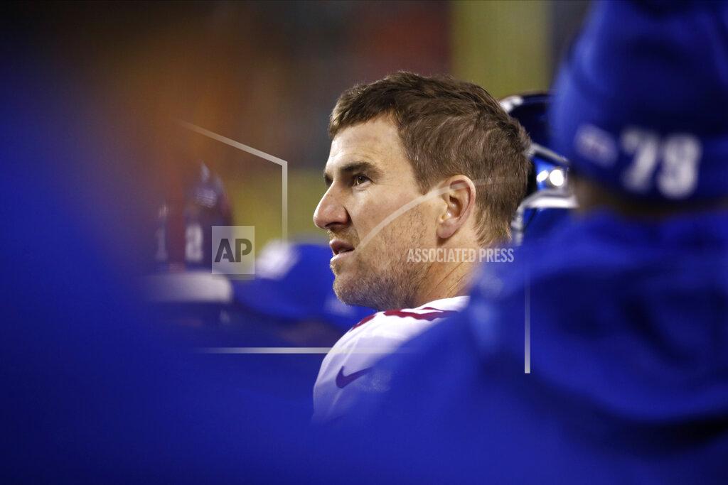 Matt Rourke New York Giants' Eli Manning looks on from the sidelines during the first half of an NFL football game against the Philadelphia Eagles, Monday, Dec. 9, 2019, in Philadelphia. (AP Photo/Matt Rourke)