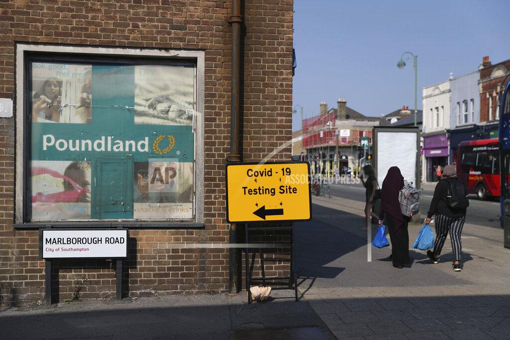Andrew Matthews A view of sign directing people to a walk-in coronavirus testing centre on Marlborough Road in Southampton, England, Wednesday, Sept. 16, 2020. The British government plans to ration coronavirus testing, giving priority to health workers and care home staff after widespread reports that people throughout the country were unable to schedule tests. Prime Minister Boris Johnson on Wednesday will face questions about his handling of the COVID-19 pandemic in the House of Commons and before a key committee amid the outcry over the shortage of testing. (Andrew Matthews/PA via AP)