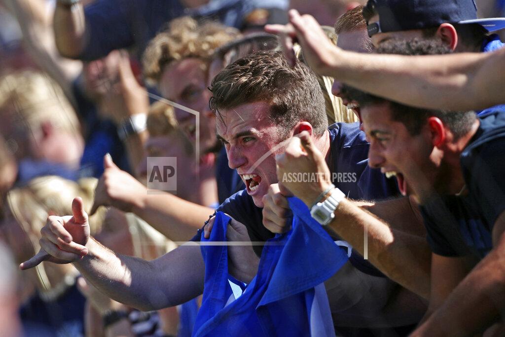 George Frey BYU fans celebrate a touchdown against Southern California during the first half of an NCAA college football game, Saturday, Sept. 14, 2019, in Provo, Utah. (AP Photo/George Frey)