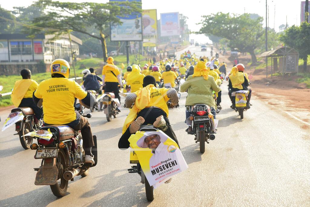 Nicholas Bamulanzeki Supporters of Ugandan President Yoweri Kaguta Museveni celebrate, in Kampala, Uganda, Saturday Jan. 16, 2021, after their candidate was declared winner of the presidential elections. Uganda’s electoral commission says longtime President Yoweri Museveni has won a sixth term, while top opposition challenger Bobi Wine alleges rigging and officials struggle to explain how polling results were compiled amid an internet blackout. In a generational clash widely watched across the African continent, the young singer-turned-lawmaker Wine posed arguably the greatest challenge yet to Museveni. (AP Photo/Nicholas Bamulanzeki)