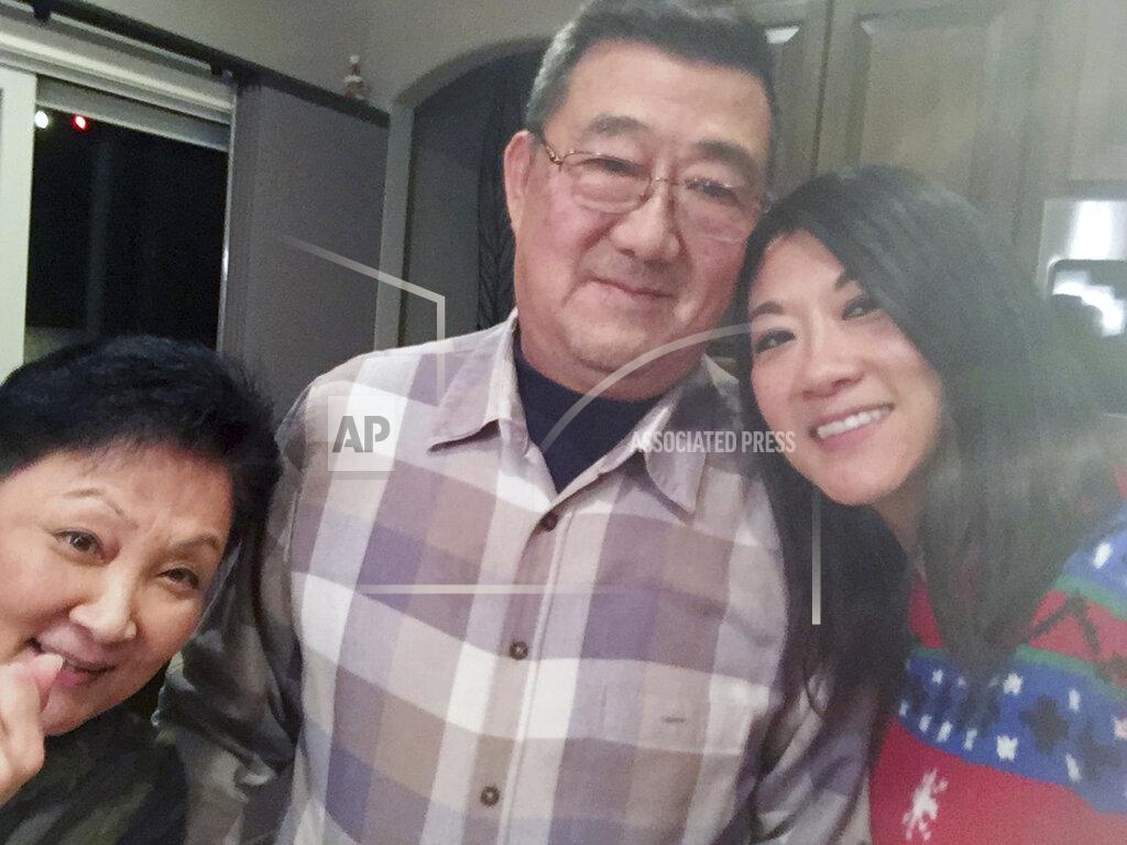 This December 2016 photo provided by the family shows, from left, Lu Wang, Ming Wang and Anne Peterson. Ming Wang, 71, was sickened in March 2020 on a cruise from Australia with his wife, a break after decades of running the family’s Chinese restaurant in Papillion, Neb. In the 74 days he was hospitalized, doctors desperately tried various experimental approaches, including enrolling him in a study of an antiviral drug that ultimately showed promise. Ming died on June 8. “It was just touch and go. Everything they wanted to try we said yes, do it,” said his daughter, Anne Peterson. “We would give anything to have him back, but if what we and he went through would help future patients, that’s what we want.” (Anne Peterson via AP)