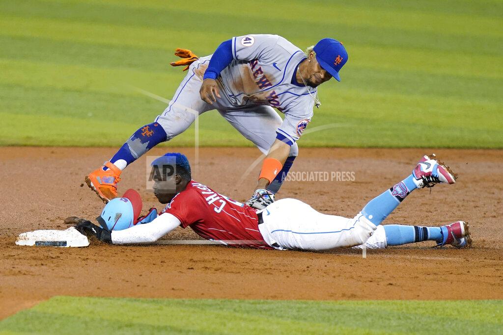 Lynne Sladky Miami Marlins' Jazz Chisholm Jr. is tagged out by New York Mets shortstop Francisco Lindor on an attempted steal of second during the first inning of a baseball game Friday, May 21, 2021, in Miami. (AP Photo/Lynne Sladky)