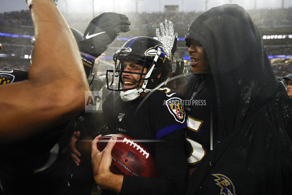 Nick Wass Baltimore Ravens kicker Justin Tucker (9) is surrounded by teammates after kicking the winning field goal against the San Francisco 49ers at the end of an NFL football game, Sunday, Dec. 1, 2019, in Baltimore, Md. Ravens won 20-17. (AP Photo/Nick Wass)