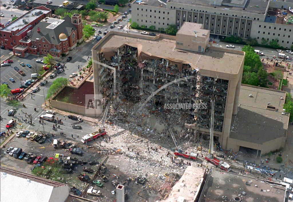Uncredited FILE - In this April 19, 1995, aerial file photo, the north side of the Alfred P. Murrah Federal Building in Oklahoma City is pictured after an explosion that killed 168 people and injured hundreds. The attack on the U.S. Capitol by an angry mob of President Donald Trump's supporters shocked many Americans, but experts note right-wing extremism has previously played out in isolated pockets of America or in smaller cities. (AP Photo/File)