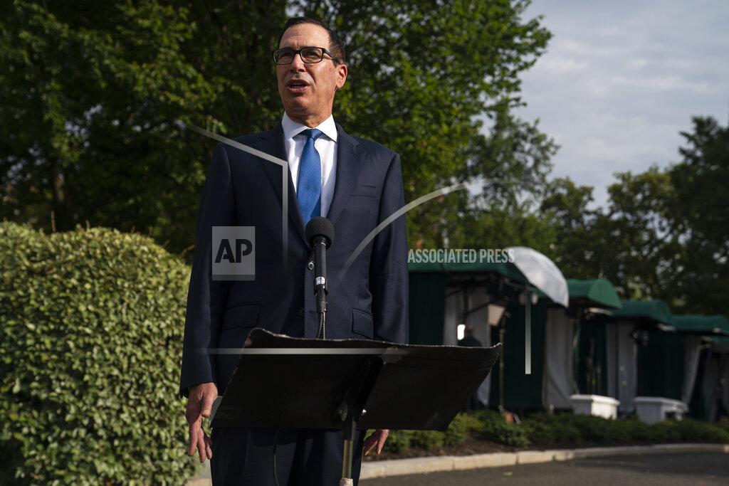 Treasury Secretary Steven Mnuchin speaks with reporters about the coronavirus relief package negotiations, at the White House, Thursday, July 23, 2020, in Washington. (AP Photo/Evan Vucci)