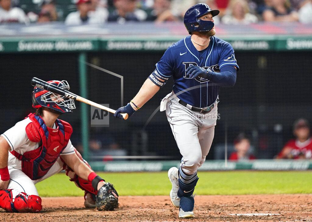 Tony Dejak Tampa Bay Rays' Austin Meadows watches his two-run home run next to Cleveland Indians catcher Austin Hedges in the ninth inning of a baseball game Saturday, July 24, 2021, in Cleveland. (AP Photo/Tony Dejak)