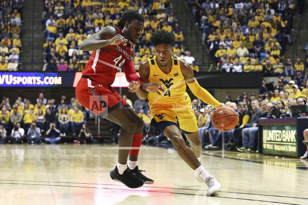 Kathleen Batten West Virginia guard Miles McBride (4) drives upcourt as he is defended by Texas Tech guard Chris Clarke (44) during the second half of an NCAA college basketball game Saturday, Jan. 11, 2020, in Morgantown, W.Va. (AP Photo/Kathleen Batten)