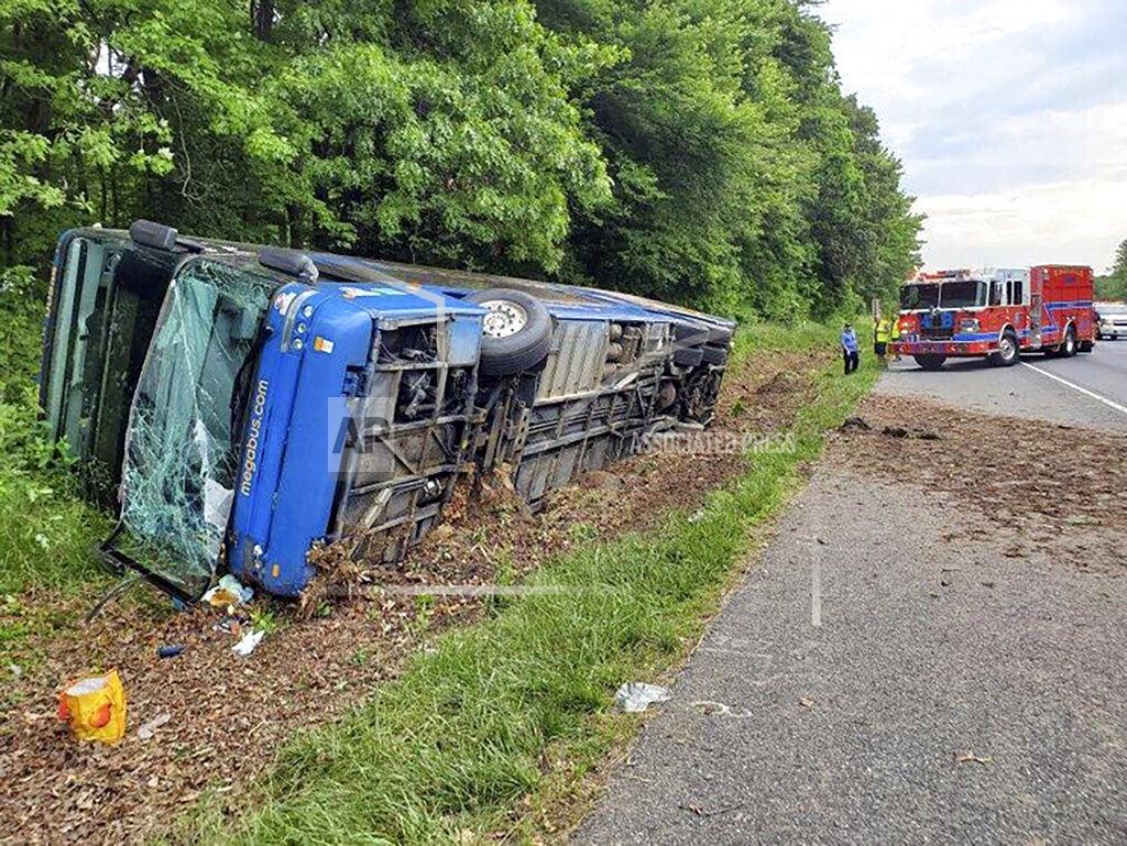 Uncredited This image provided by the Baltimore County Fire Department shows the scene of a Megabus crash on I-95 south near Kingsville, Md., Sunday, May 22, 2022. (Baltimore County Fire Department via AP)