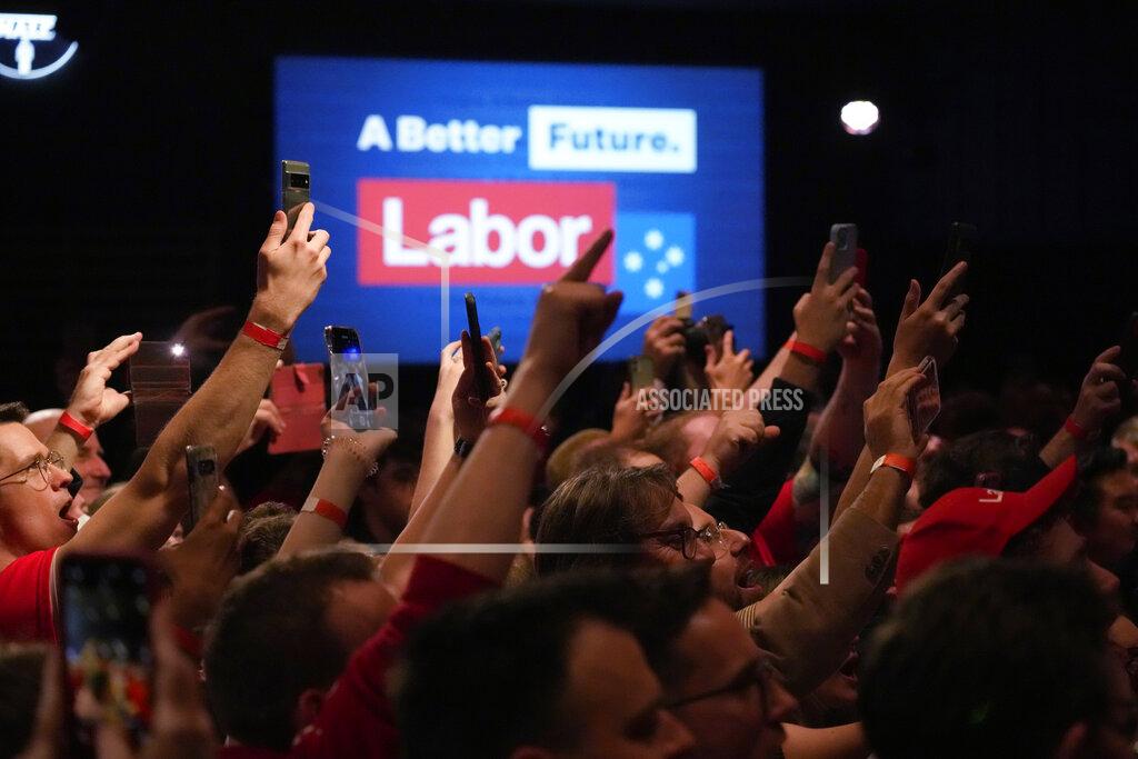Rick Rycroft Supporter cheer the arrival of Labor Party leader Anthony Albanese at a Labor Party event in Sydney, Australia, Sunday, May 22, 2022, after Prime Minister Scott Morrison conceding defeat to Albanese in a federal election. (AP Photo/Rick Rycroft)