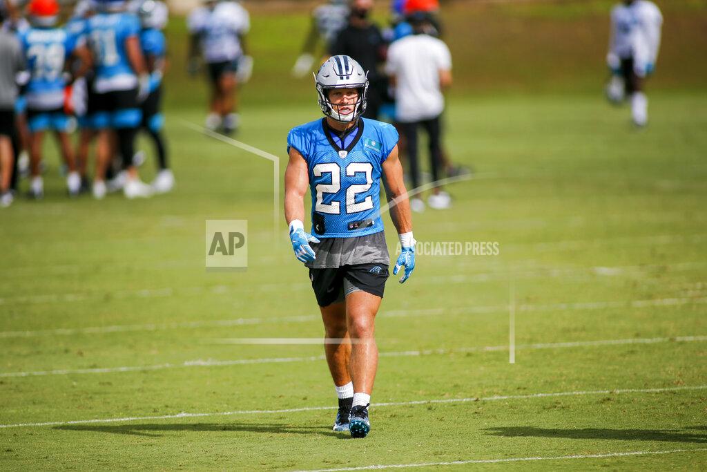 Nell Redmond Carolina Panthers running back Christian McCaffrey walks across the practice field during a break at the NFL football team's training camp practice Sunday, Aug. 16, 2020 in Charlotte, N.C. (AP Photo/Nell Redmond)