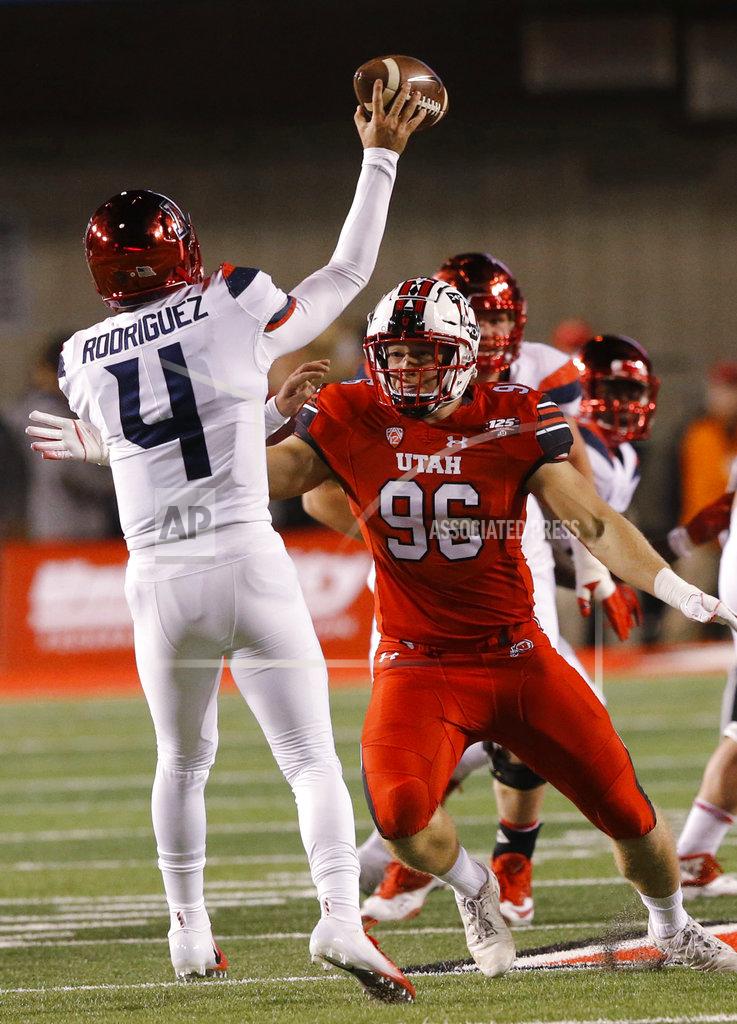 Rick Bowmer Utah defensive end Nick Heninger (96) hurries the pass from Arizona quarterback Rhett Rodriguez (4) during the first half of an NCAA college football game Friday, Oct. 12, 2018, in Salt Lake City. (AP Photo/Rick Bowmer)