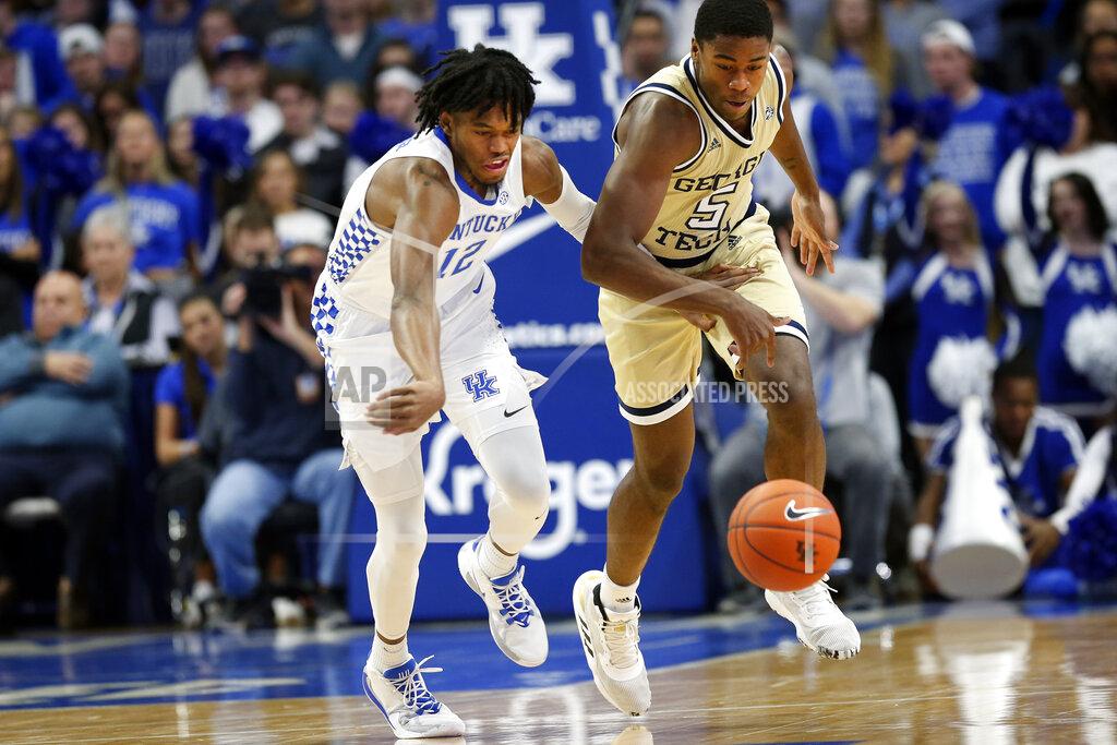 James Crisp Kentucky's Keion Brooks Jr., left, and Georgia Tech's Moses Wright go after a loose ball during the first half of an NCAA college basketball game in Lexington, Ky., Saturday, Dec. 14, 2019. (AP Photo/James Crisp)