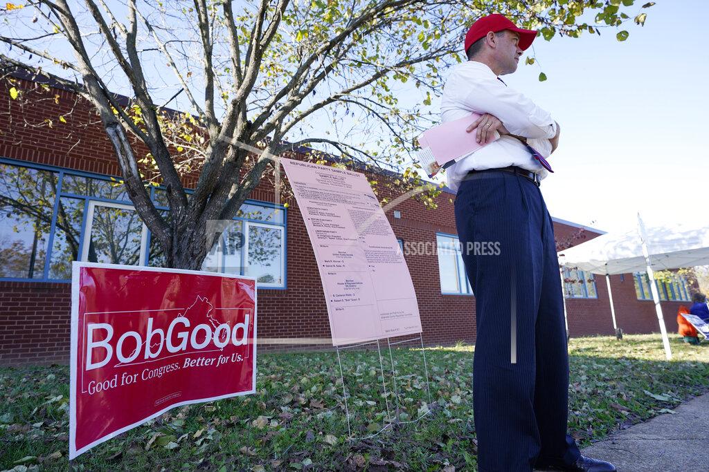 Steve Helber Republican Congressional candidate Bob Good waits for voters at a polling place in Charlottesville, Va., Tuesday Nov. 3, 2020. Good is facing Democrat Cameron Webb in today's election. (AP Photo/Steve Helber)