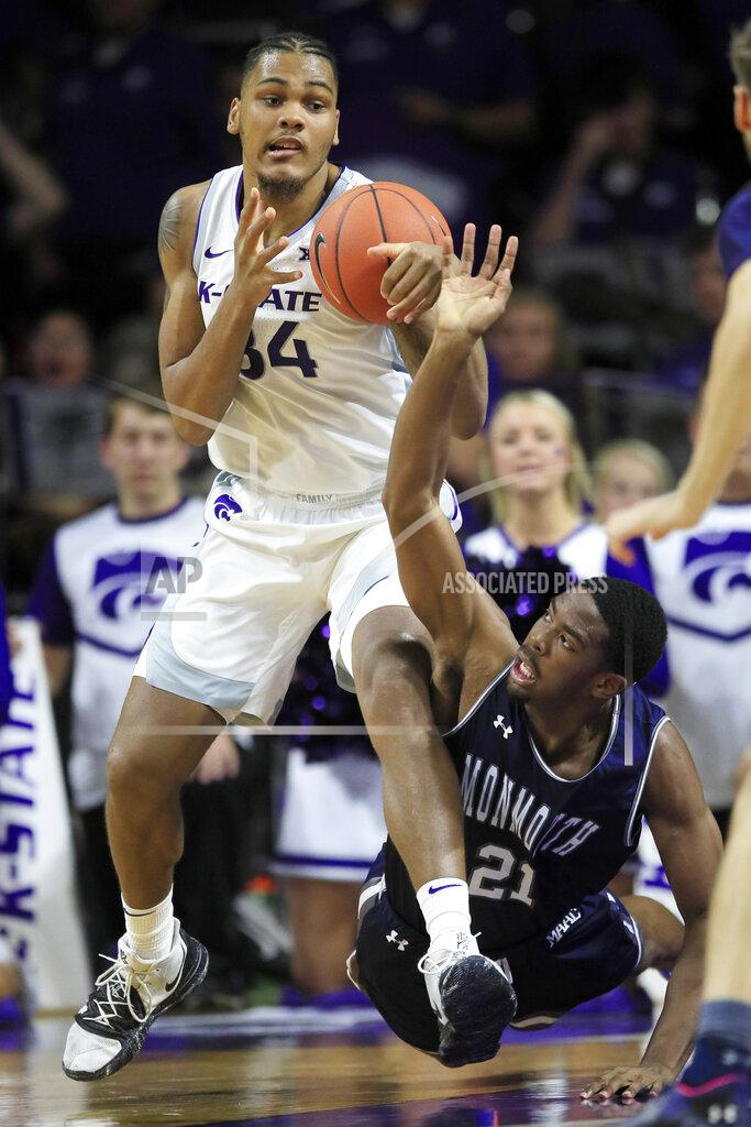 Orlin Wagner Kansas State forward Levi Stockard III (34) breaks away from Monmouth forward Nikkei Rutty (21) during the first half of an NCAA college basketball game in Manhattan, Kan., Wednesday, Nov. 13, 2019. (AP Photo/Orlin Wagner)