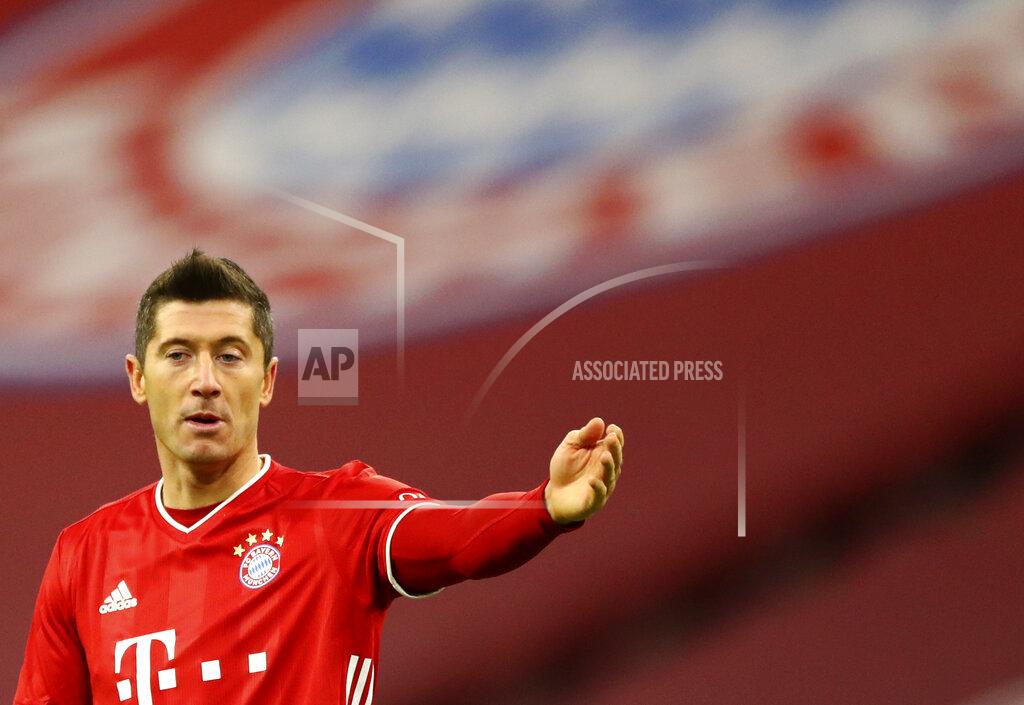 Matthias Schrader Bayern's Robert Lewandowski reacts during the German Bundesliga soccer match between FC Bayern Munich and SV Werder Bremen in Munich, Germany, Saturday, Nov. 21, 2020. (AP Photo/Matthias Schrader)