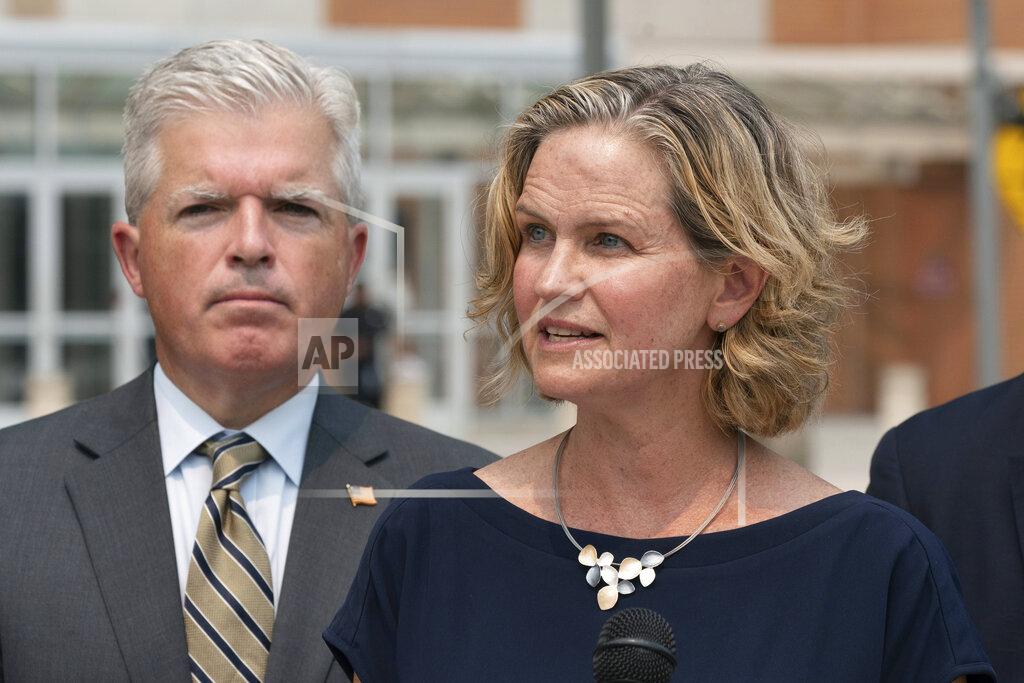 Mark Lennihan Nassau County Executive Laura Curran, right, speaks at a news conference to discuss a settlement in an opioid trial, Tuesday, July 20, 2021, in Central Islip, N.Y. Suffolk County Executive Steve Bellone is behind her. New York State reached an agreement Tuesday with the distribution companies AmerisourceBergen, Cardinal Health and McKesson to settle an ongoing trial. That deal alone would generate more than $1 billion to abate the damage done by opioids there. The trial is expected to continue, but the settlement leaves only three drug manufacturers as defendants. (AP Photo/Mark Lennihan)