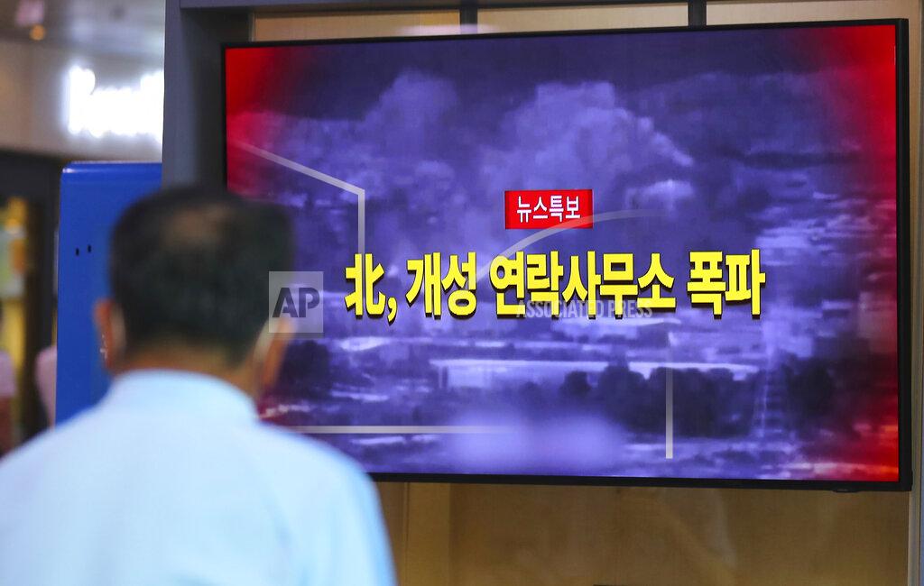 Kim Do-Hun A man watches a TV screen showing a news program about the demolition of the inter-Korean liaison office building, at the Seoul Railway Station in Seoul, South Korea, Tuesday, June 16, 2020. North Korea blew up an inter-Korean liaison office building just north of the heavily armed border with South Korea on Tuesday in a dramatic display of anger that sharply raises tensions on the Korean Peninsula and puts pressure on Washington and Seoul amid deadlocked nuclear diplomacy. The letters read "North Korea, demolition of the inter-Korean liaison office building in Kaesong." (Kim Do-hun/Yonhap via AP)